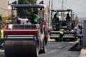 Maquinaria para pavimentar en calle de Puebla 