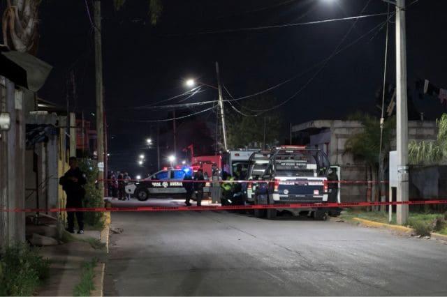 Policías en domicilio de Coronango donde ocurrió un doble asesinato; mejorada con IA