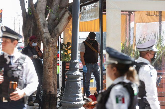 Policías de Puebla en levantamiento de cadáver 