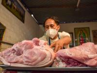 Carniceria de carne de cerdo y un tablajero