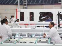 Empleados en una fábrica en Puebla 