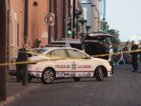 Patrulla estacionada en calle del Centro Histórico de Puebla 