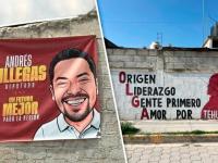 Lona de Andrés Villegas y barda pintada de Olga Romero