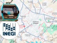 Góndola de cablebús sobre un mapa del INEGI