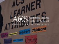 Portada y logo de la página web de la Annunciation Catholic School