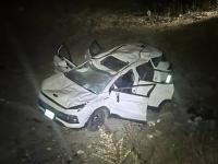Auto volcado en el tramo Inopilco, sobre la carretera estatal Tecomatlán-Piaxtla